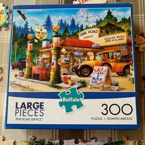 PICK ANY 3 ITEMS FOR $10 - Buffalo Pine Road Service 300-Piece Puzzle